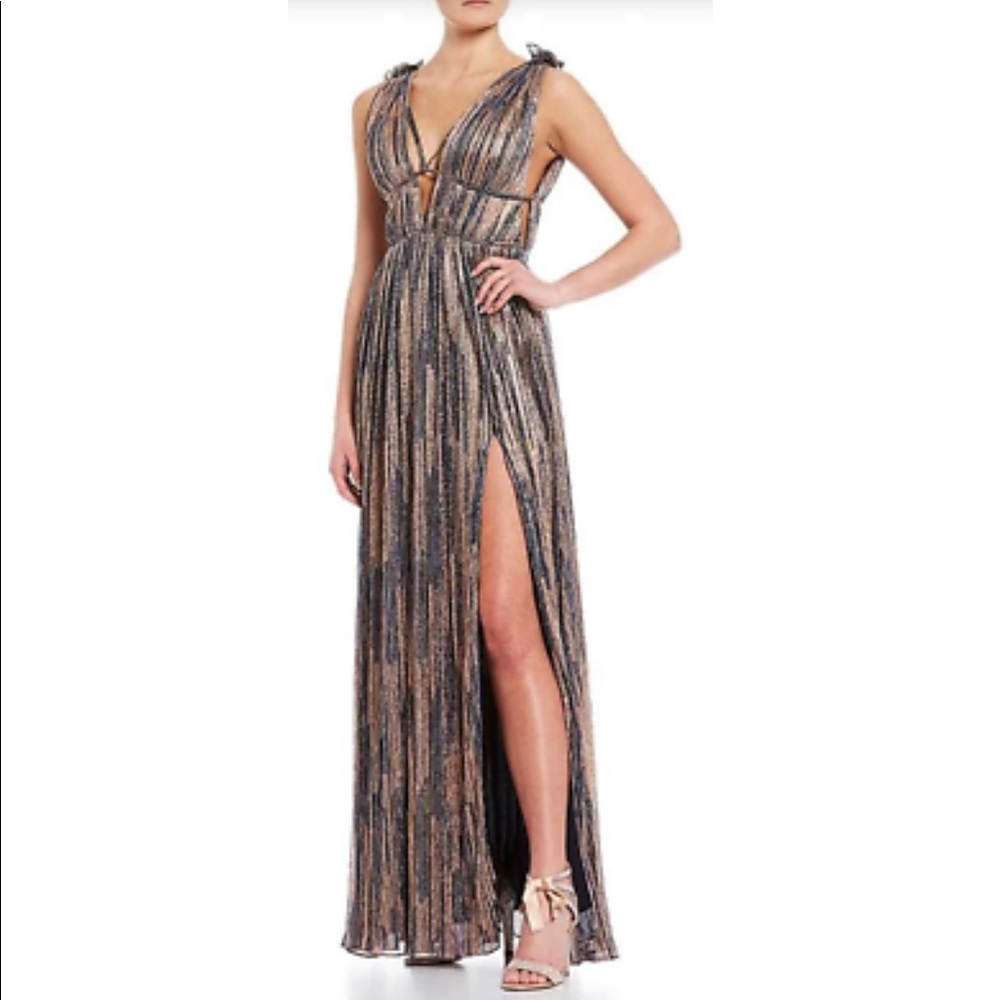 Multi colored, metallic, full length GB gown. Slit located on left hand side.
